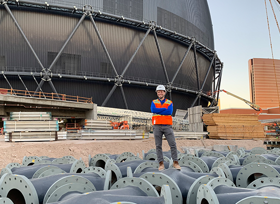 Stephen Reichwein stands on building materials outside the Las Vegas Sphere, the largest spherical structure on Earth, which he served as project director and lead structural designer for.