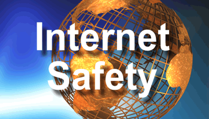 Clipart of a globe with the words Internet Safety on it.
