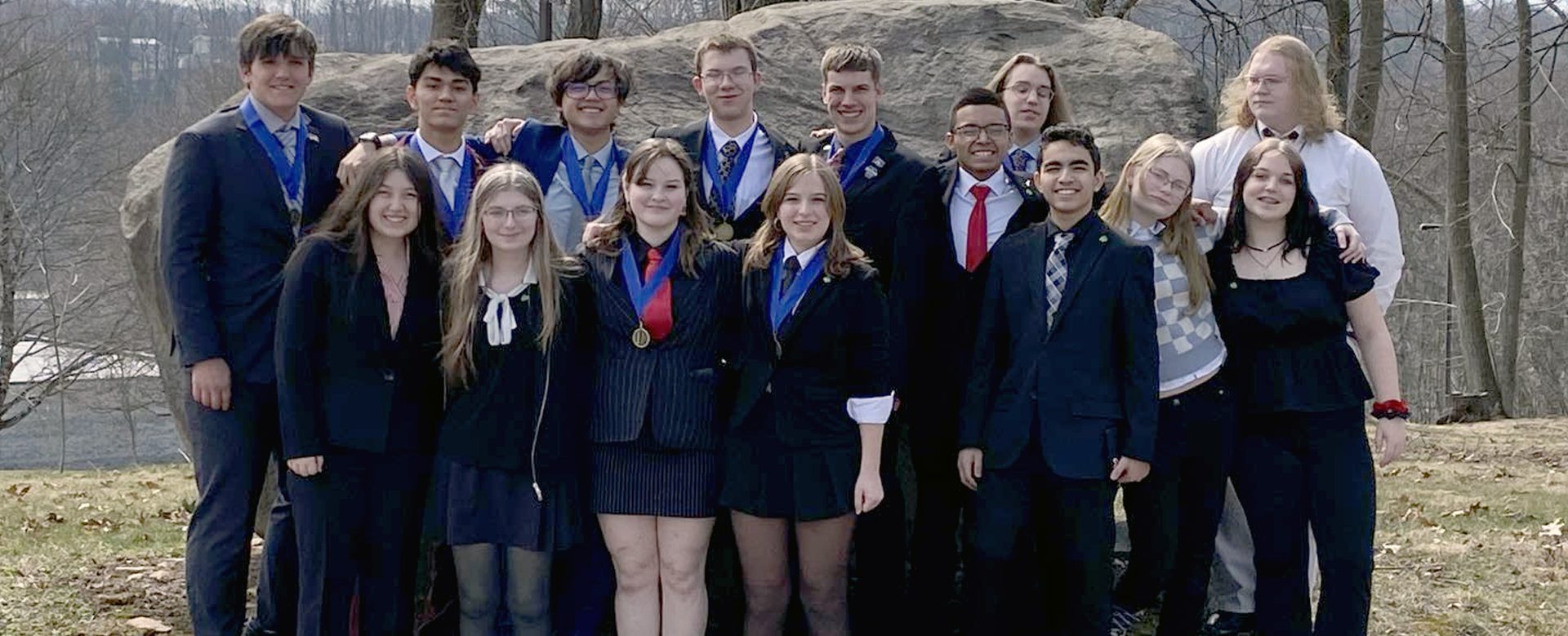 North Schuylkill's championship Quiz Bowl team poses outdoors with medals after winning the 2025&ndash;2026 Schuylkill League title and back-to-back championships.