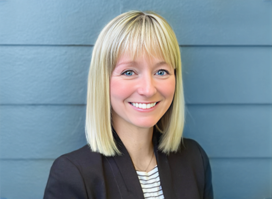 Dr. Nicole O'Regan, vaccine researcher and pharmaceutical executive, in a professional headshot.